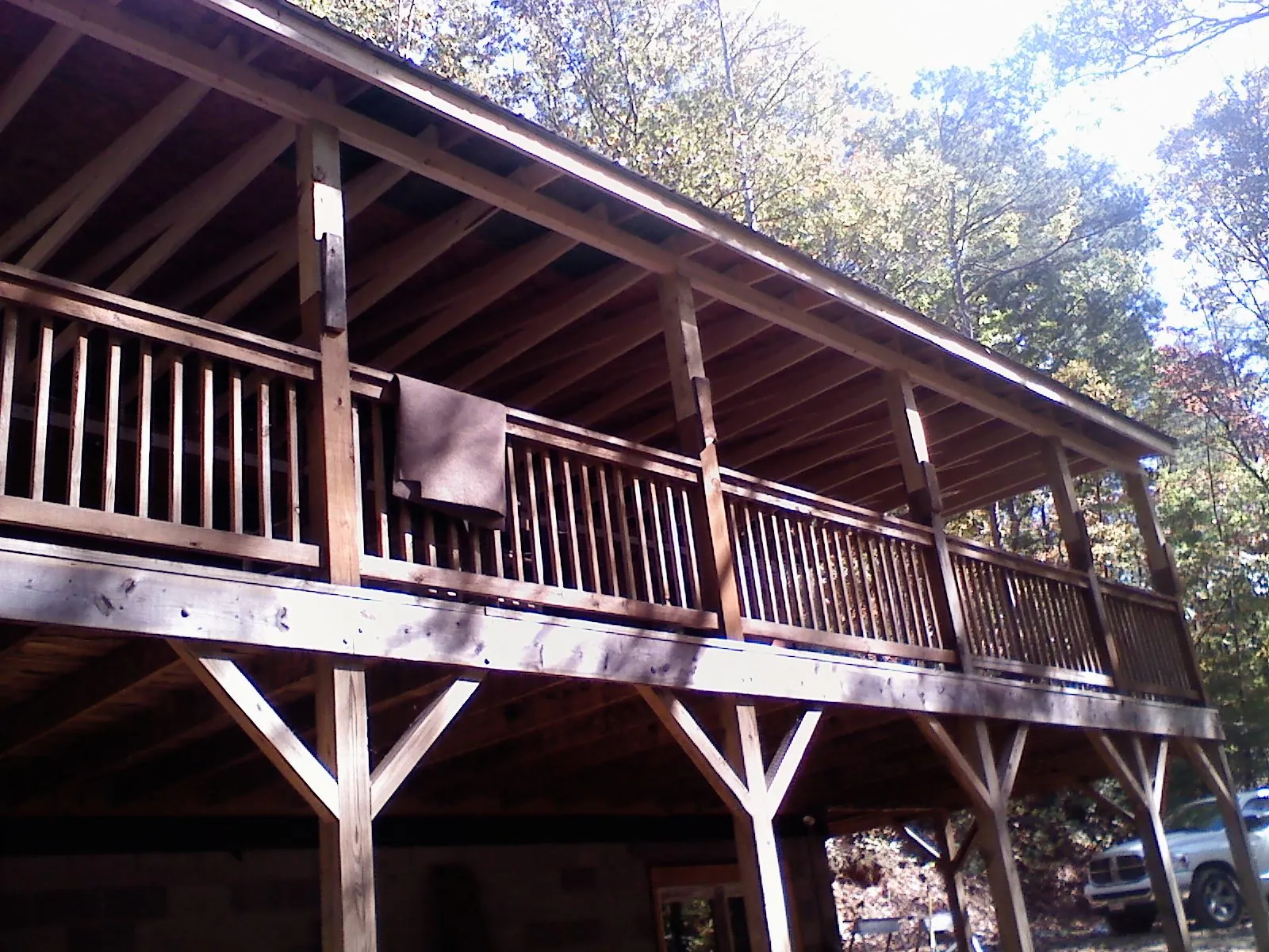 Timber framing under a new elevated porch and deck — Roof Leak Repair in Toronto by Roofing Brothers